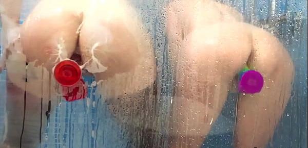  Red and Lucy fuck their toys in the shower